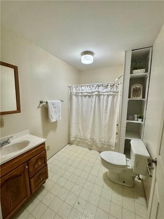 full bathroom with shower / bathtub combination with curtain, vanity, and toilet