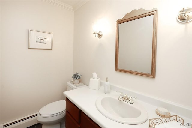 bathroom with a baseboard radiator, vanity, toilet, and ornamental molding