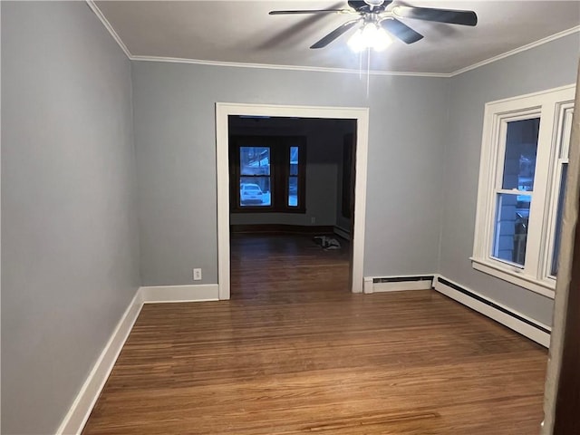 unfurnished room with hardwood / wood-style flooring, a baseboard radiator, ornamental molding, and ceiling fan