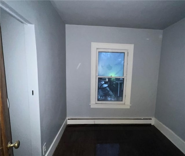 spare room with a baseboard radiator