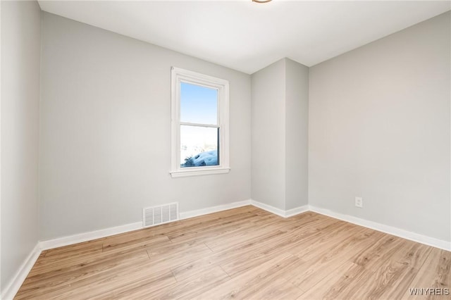 empty room featuring light hardwood / wood-style floors