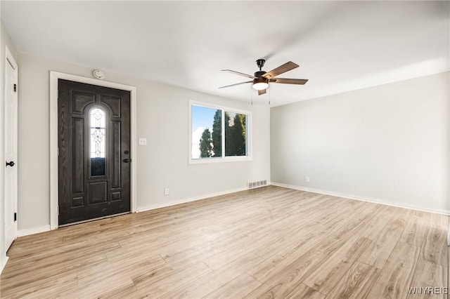 foyer featuring light hardwood / wood-style floors and ceiling fan