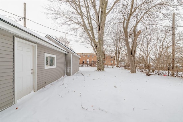 view of yard covered in snow