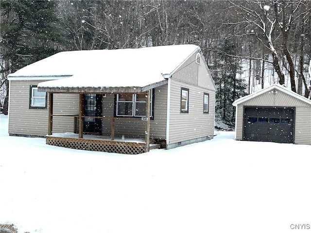 view of front of house featuring an outbuilding and a garage