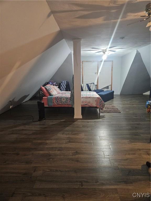 bedroom featuring dark wood-type flooring