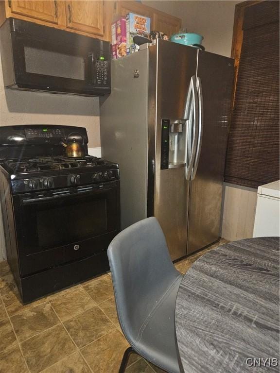 kitchen with black appliances