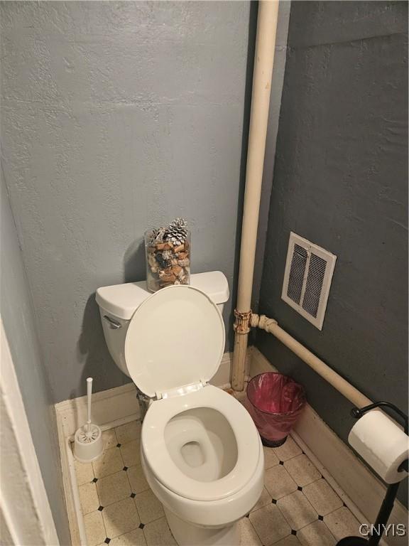 bathroom featuring toilet