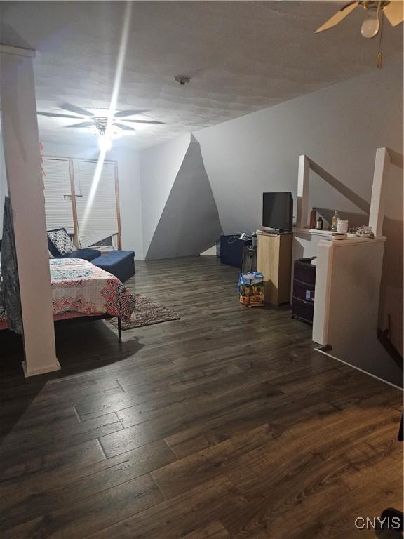 bedroom featuring dark wood-type flooring