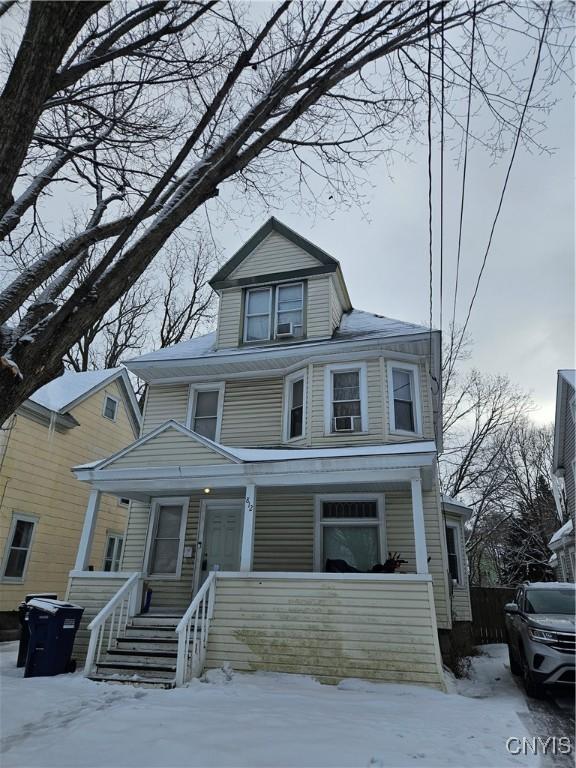 view of front of home featuring covered porch