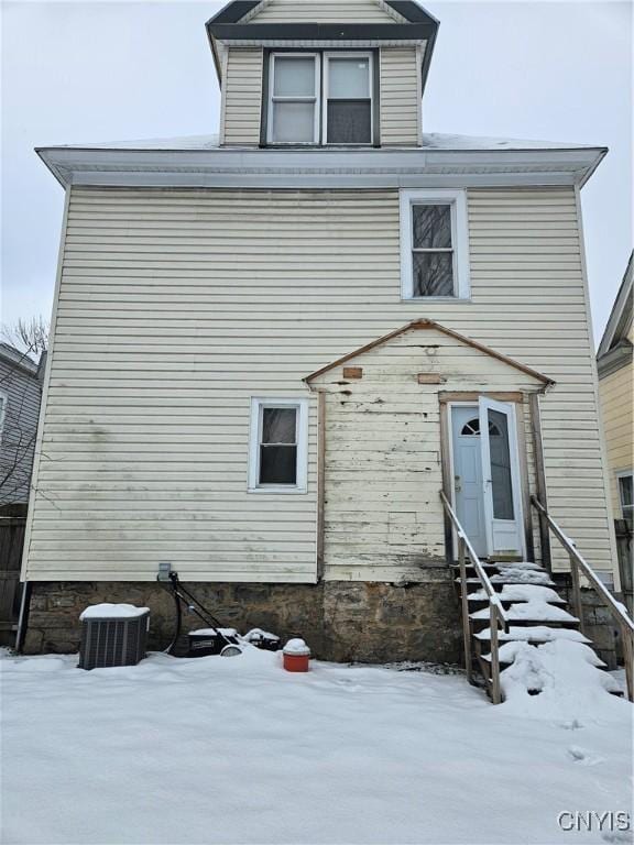 view of front property with cooling unit