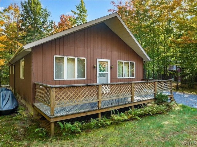 view of property exterior featuring a deck