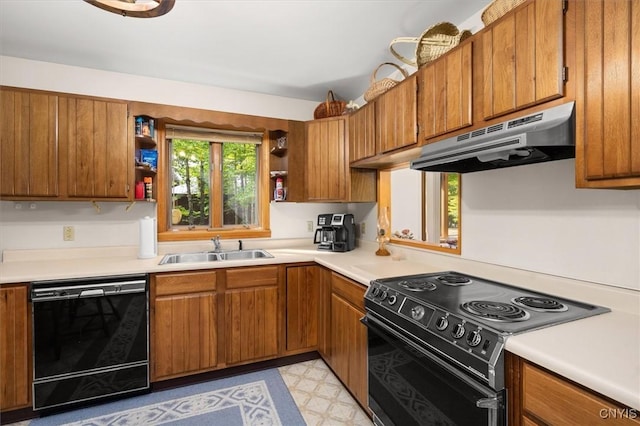 kitchen featuring sink and black appliances