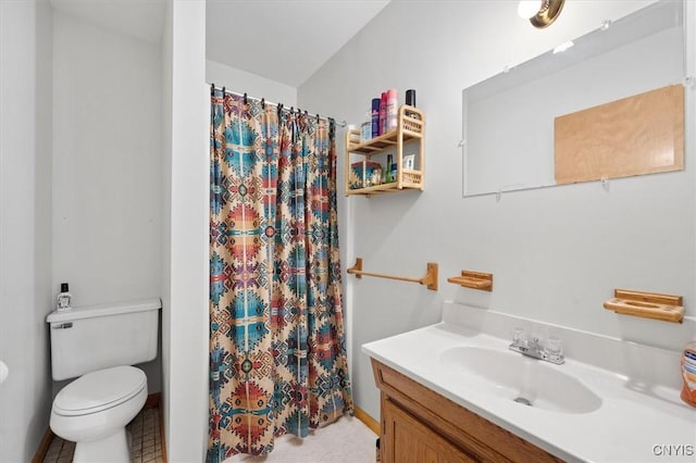 bathroom with vanity, a shower with curtain, and toilet