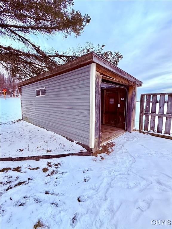 view of snow covered garage