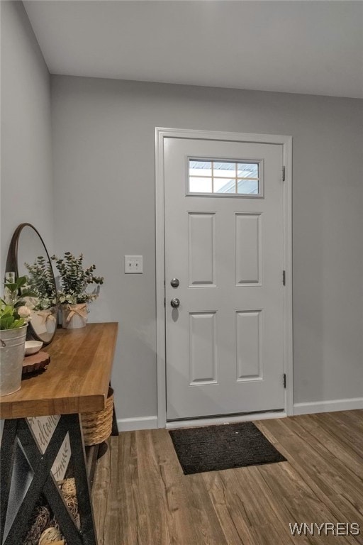 entrance foyer with hardwood / wood-style floors