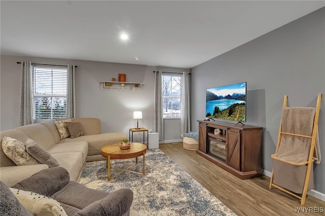 living room with light hardwood / wood-style floors