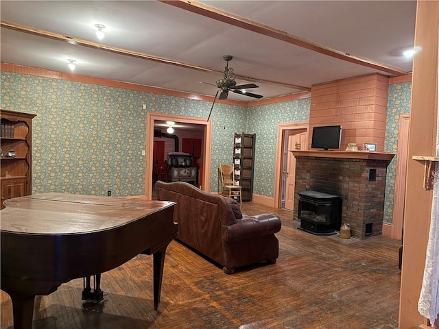 living room with ceiling fan and wood-type flooring