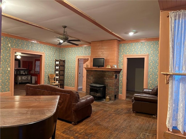 living room featuring ceiling fan and hardwood / wood-style floors