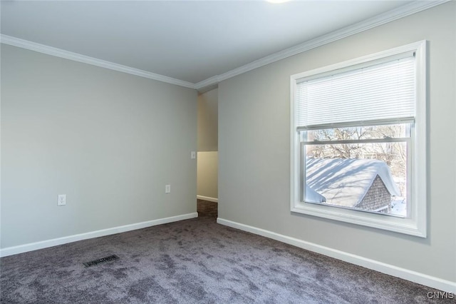 unfurnished room with crown molding and carpet