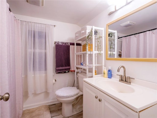 full bathroom with vanity, shower / bathtub combination with curtain, and toilet