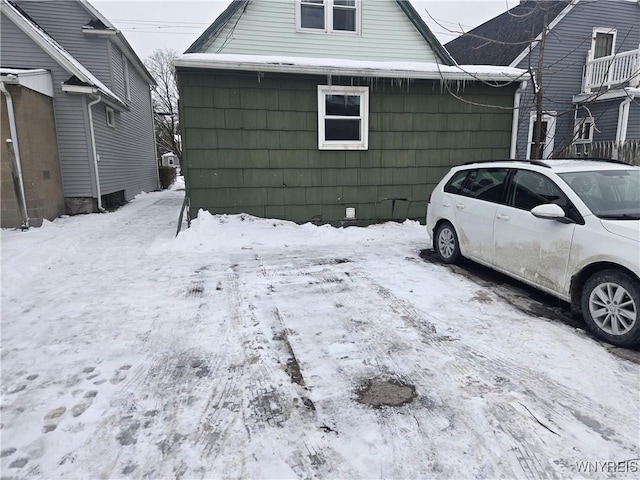 view of snow covered property