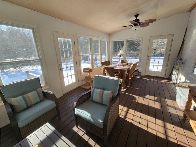 sunroom / solarium featuring vaulted ceiling and ceiling fan