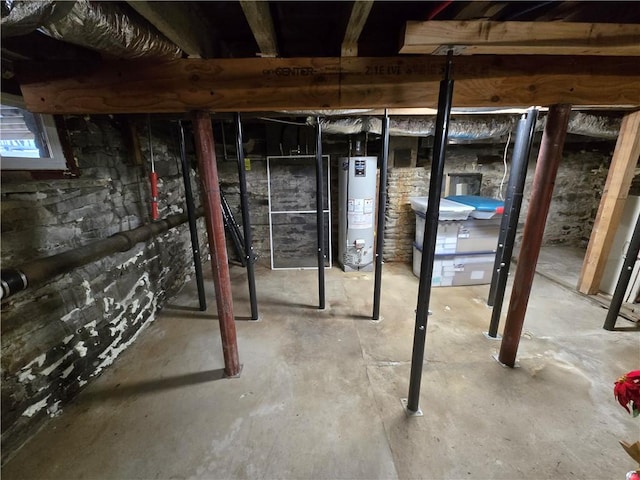 basement featuring gas water heater