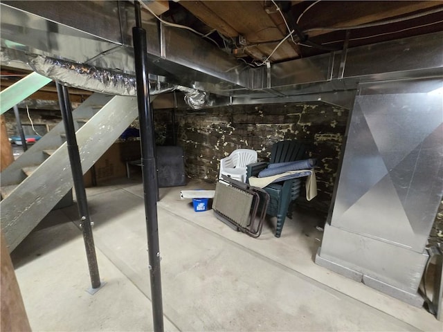 unfinished basement with stairway