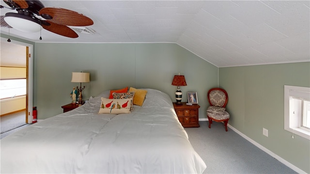 bedroom with lofted ceiling, carpet flooring, and ceiling fan