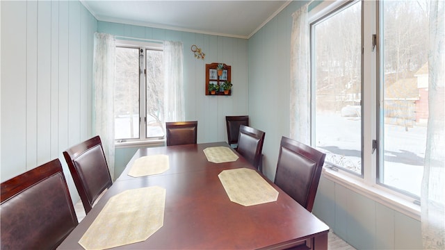 dining room featuring ornamental molding