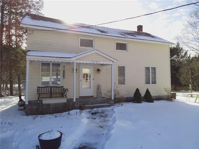 view of front of property featuring covered porch