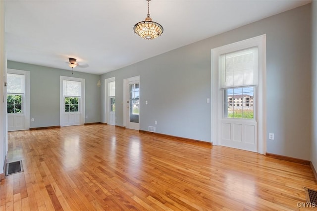 entrance foyer with light hardwood / wood-style floors