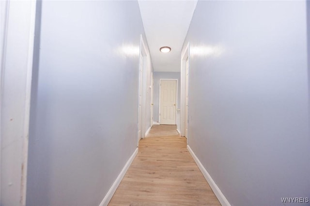 corridor featuring light wood-type flooring