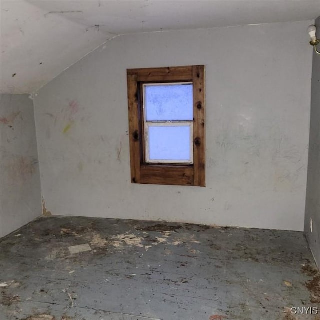 bonus room with vaulted ceiling