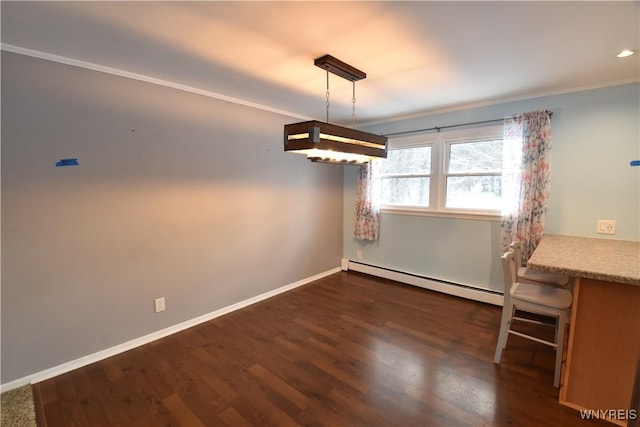 unfurnished dining area featuring dark wood-type flooring, a baseboard radiator, and ornamental molding