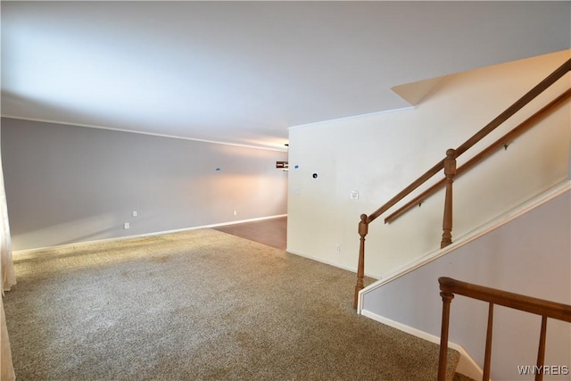 unfurnished room featuring carpet flooring