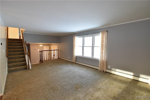 carpeted empty room featuring crown molding