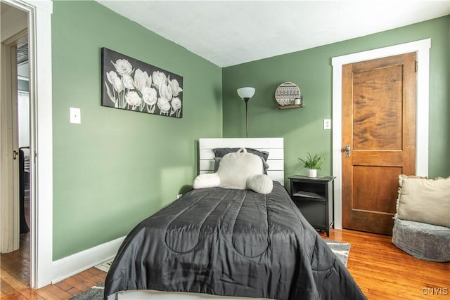 bedroom featuring hardwood / wood-style flooring