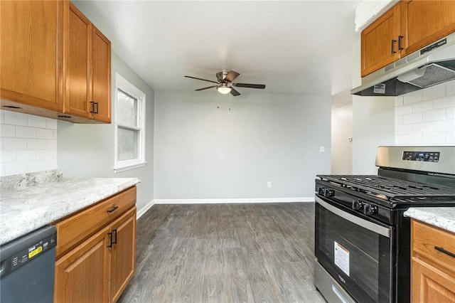 kitchen featuring tasteful backsplash, black dishwasher, dark hardwood / wood-style flooring, and stainless steel gas range