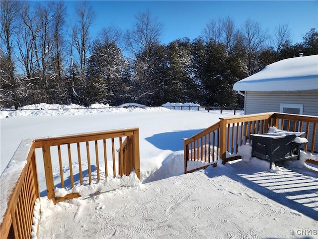 view of snow covered deck