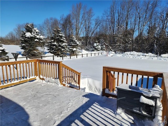 view of snow covered deck