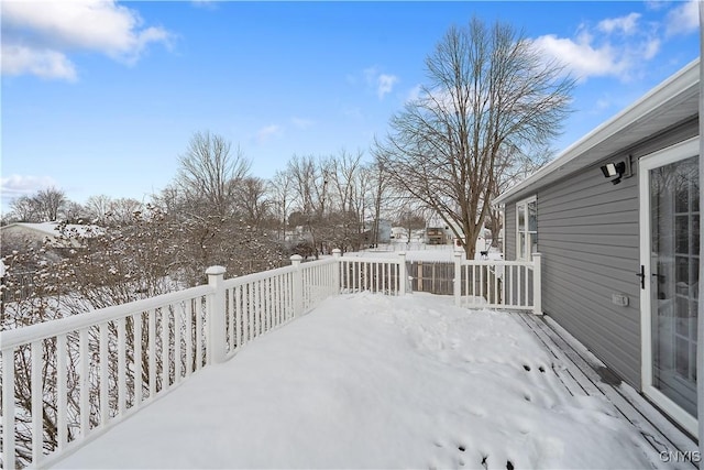 view of snow covered deck