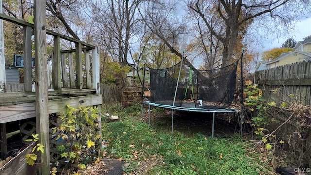 view of yard with a trampoline