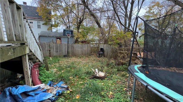 view of yard featuring a trampoline