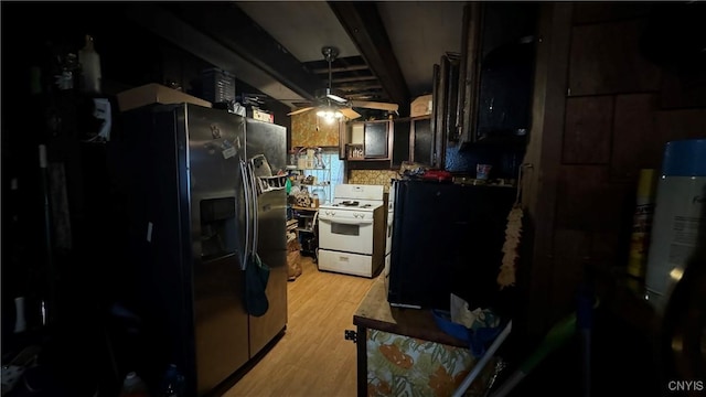 kitchen with ceiling fan, stainless steel fridge, white gas stove, and light wood-type flooring