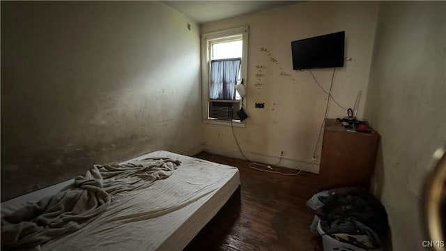 bedroom featuring dark hardwood / wood-style floors