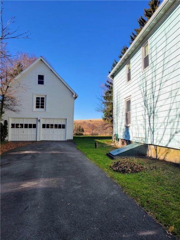 view of home's exterior featuring a garage