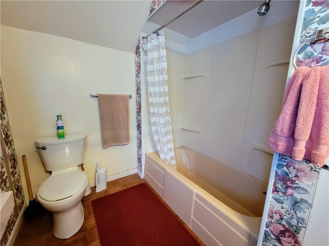 bathroom with parquet flooring, shower / bath combo with shower curtain, and toilet