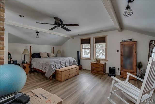 bedroom with lofted ceiling with beams, ceiling fan, and light wood-type flooring