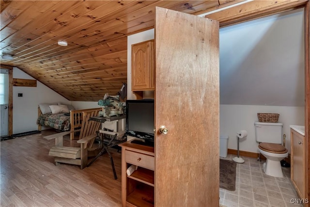 additional living space featuring lofted ceiling, wooden ceiling, and light wood-type flooring